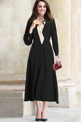 Elegante vestido midi negro de oficina de Kate Middleton